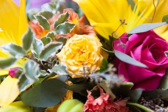 A close up of a colorful bouquet of flowers.