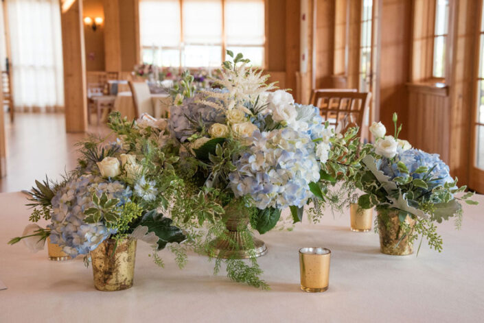 A table with blue and gold flowers on it.