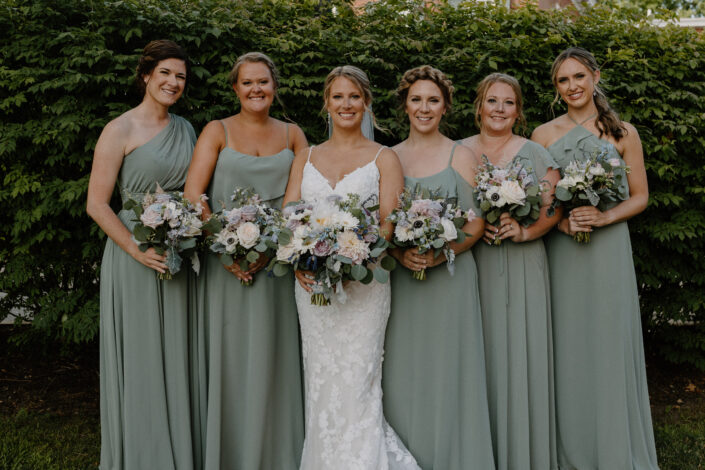 Bridesmaids in Sage Green Dresses in Maddie and Sean Wedding