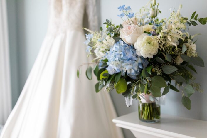 bridal dress with white and blue flowers